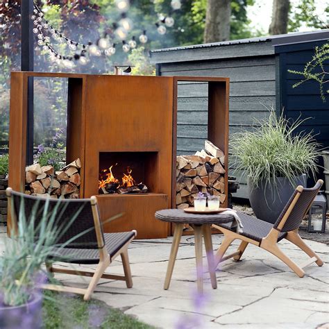 Outdoor fireplace ideas:13 ways to warm up your backyard | Homes & Gardens