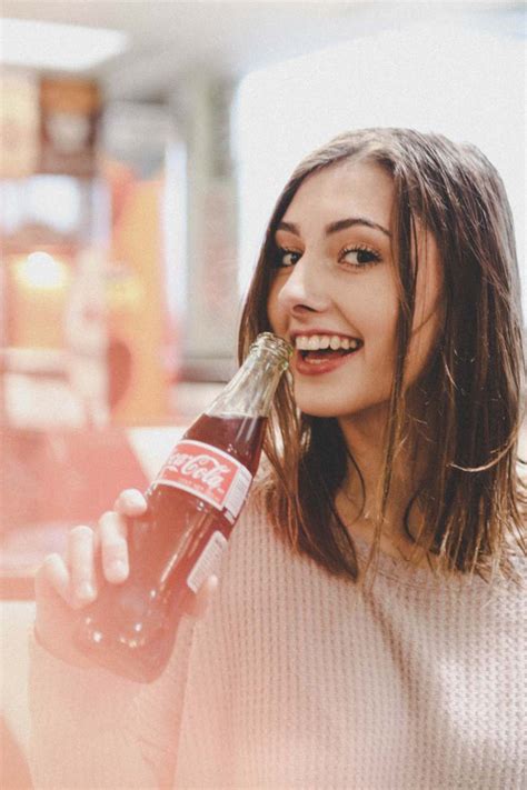 Woman Holding Coca Cola Bottle Image Free Photo