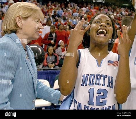 North Carolina Head Coach Sylvia Hatchell Looks On As Ivory Latta Holds