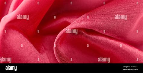 Texture of bright red fabric, closeup Stock Photo - Alamy