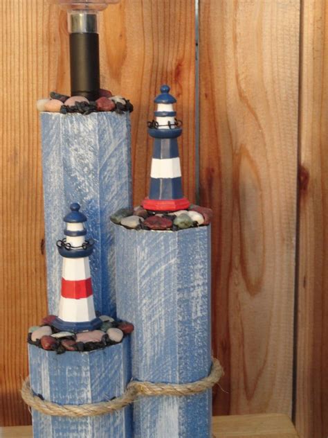 Wooden post decor with solar light and lighthouses | Solar light crafts ...