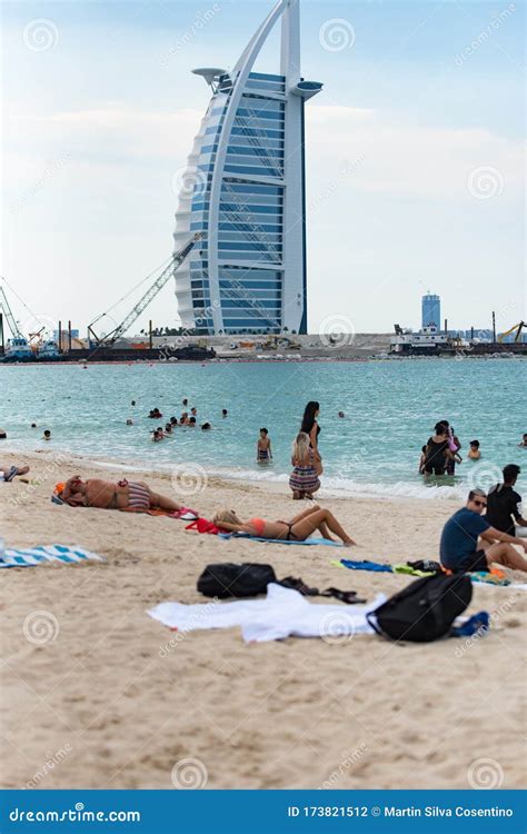 People Enjoying the Jumeirah Beach in Dubai Witch is a White Sand Beach ...