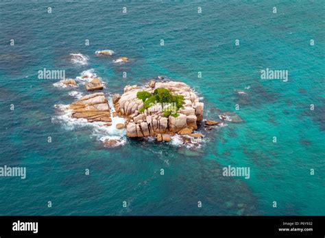 Aerial view of a small rocky island on the Seychelles in the Indian Ocean Stock Photo - Alamy