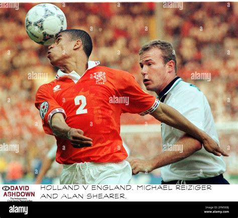 Alan Shearer Of England And Michael Reiziger Of Holland In Action