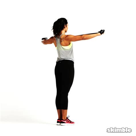 Rear Delt Squeeze With Band Exercise How To Workout Trainer By Skimble