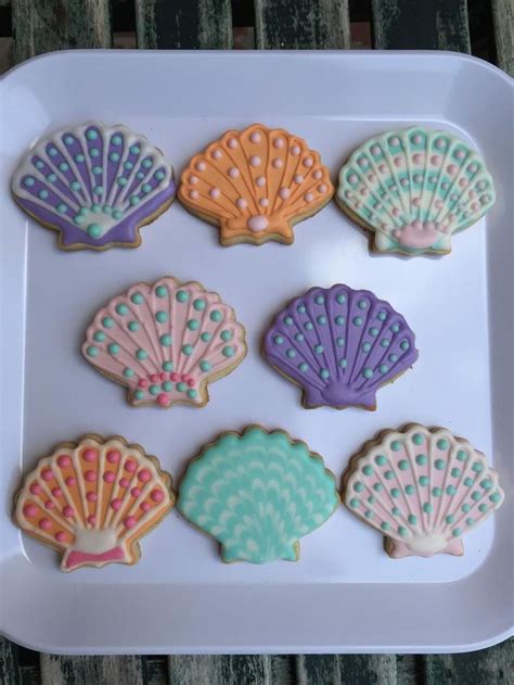 Decorated Cookies In The Shape Of Seashells On A Plate