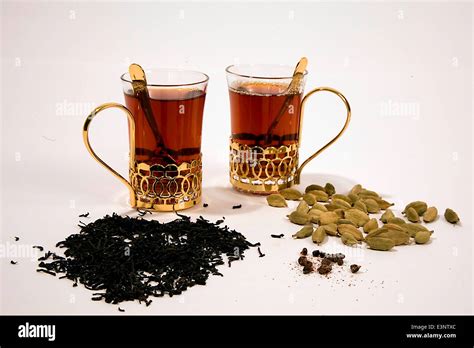 Arabic Tea Glasses With Tea Leaves And Cardamom Spice Stock Photo Alamy