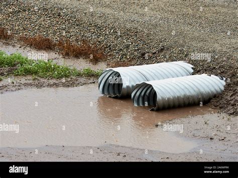 Drainage Culvert Pipe In The Rain Water Stock Photo Alamy