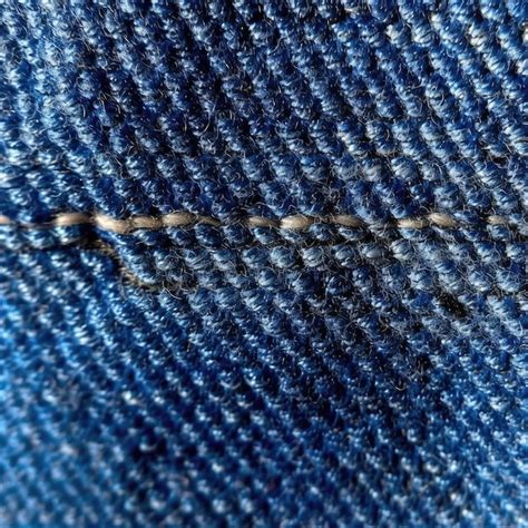 Premium AI Image | close up picture of a blue jeans fabric