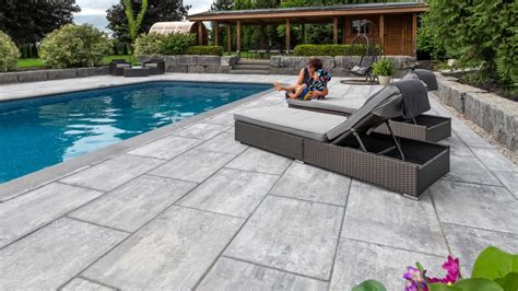 Contemporary Pool Deck With Smooth Pavers Unilock