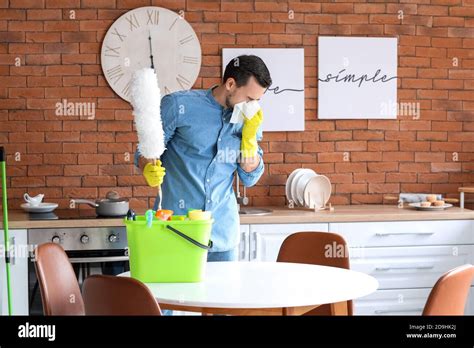 Allergic Man Cleaning His Flat Stock Photo Alamy