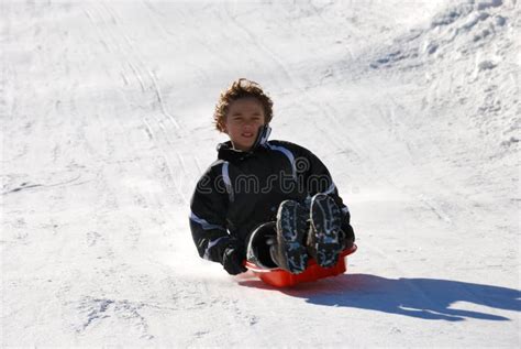 Boy Sledding Down The Hill Stock Photo Image Of Cold 7637928