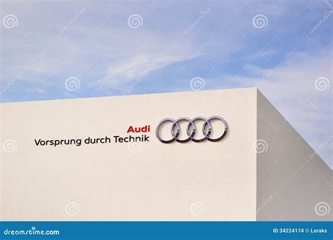 Audi, Edge through Technology on a White Wall Against Blue Sky ...