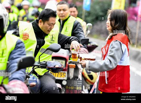 Chinese Migrant Workers Queue Up To Have Their Motorcycles To Be