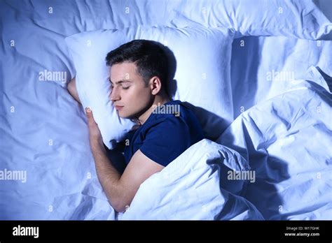 Man Sleeping In Bed At Night Hi Res Stock Photography And Images Alamy