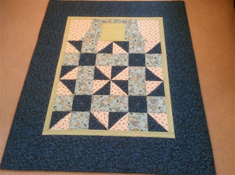 Lap Quilt With Pockets