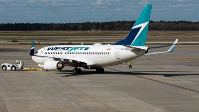 C FIBW Boeing 737 7CT WestJet Airlines Derek MacPherson JetPhotos