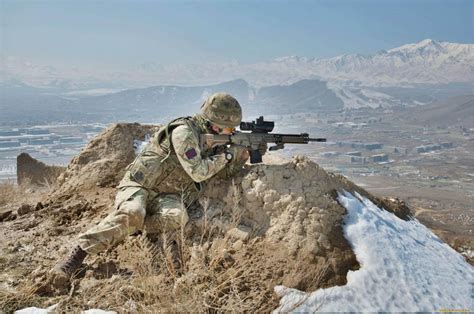 A British Soldier Provides Overwatch With His L129a1 Sharpshooter Rifle