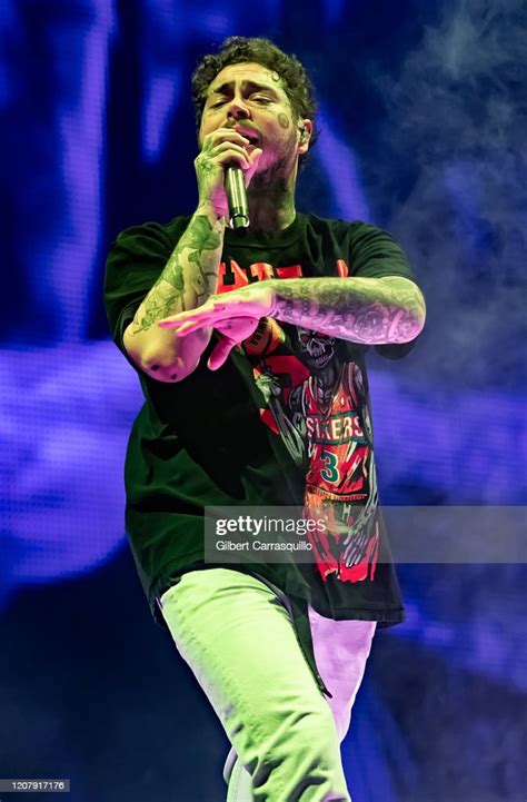 Post Malone performs during the "Runaway Tour" at Wells Fargo Center ...