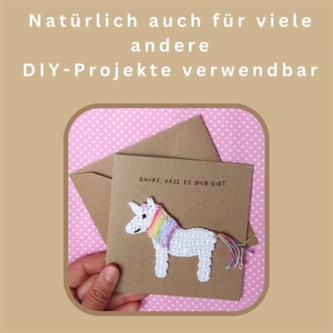 Kleines Einhorn mit Regenbogenmähne Gehäkelte Applikation zum