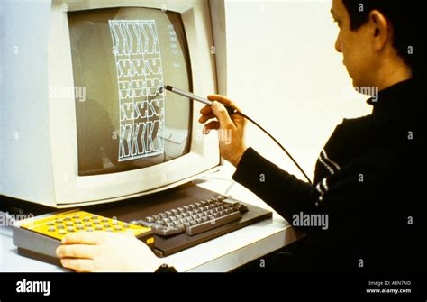 Man Using Light Pen To Draw On Computer Stock Photo - Alamy