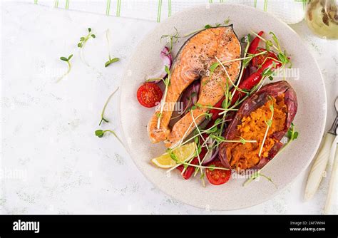 Healthy Food Baked Salmon And Sweet Potato And Vegetables Top View