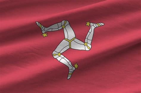 Premium Photo Isle Of Man Flag With Big Folds Waving Close Up Under