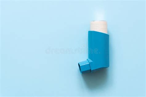 Blue Asthma Inhaler With Spray Coming Out On Black Background Stock Photo - Image of treatment ...