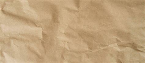 Crumpled Brown Paper Background And Texture With Copy Space