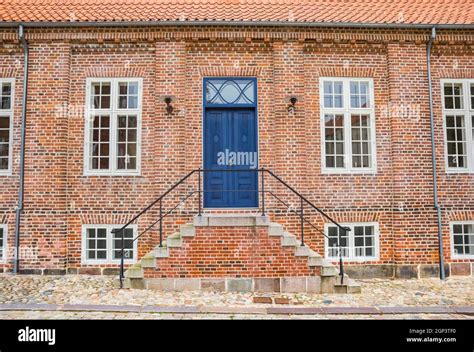 Steps And Blue Door Of A Historic Red Brick House In Viborg Denmark