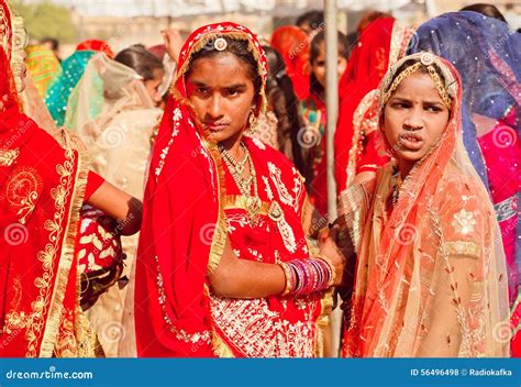 Beautiful Indian Girls Posing Serious in Colorful Crowd Editorial Stock ...