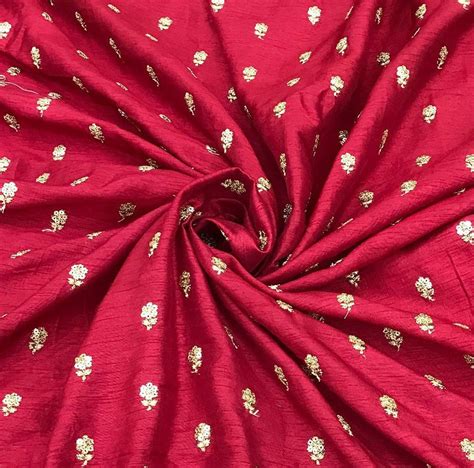 Red Flower Butti Embroidered Viscose Dola Silk Fabric At Rs