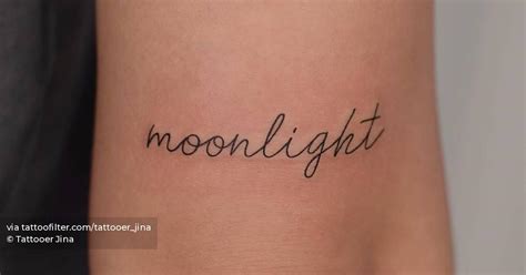 Moonlight Lettering Tattoo On The Tricep