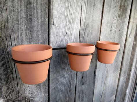 Terra Cotta Flower Pots With Wall Support Rack Wall Hanging