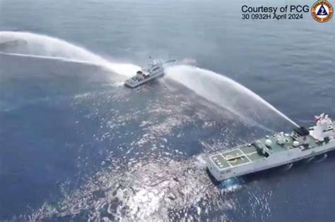 China Fires Water Cannon At Philippine Vessels Abs Cbn News