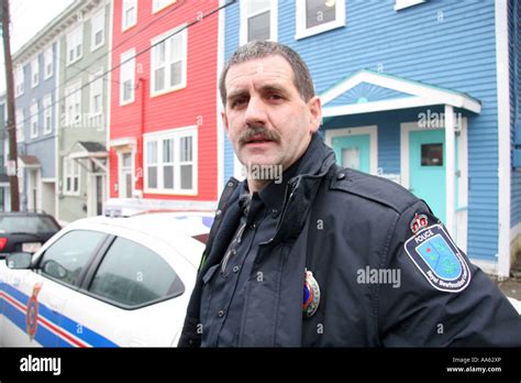 Royal Newfoundland Constabulary constable in downtown St John s Stock ...