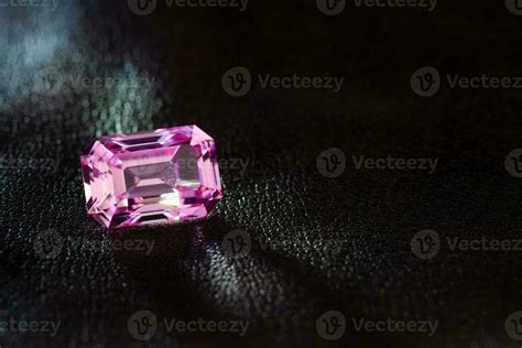 Pink Sapphire Stone on Black Background 24346943 Stock Photo at Vecteezy