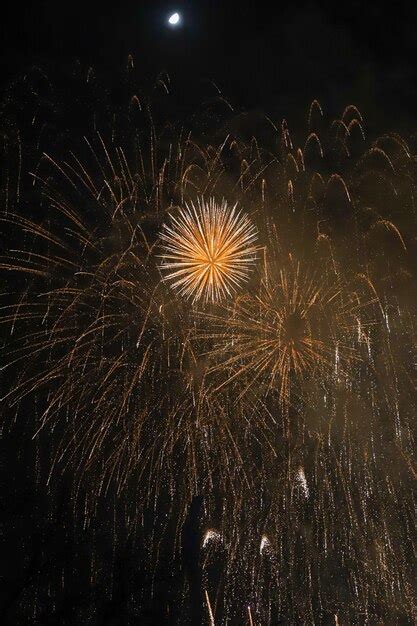 Premium Photo Fireworks Of Different Colors And Shapes Exploding