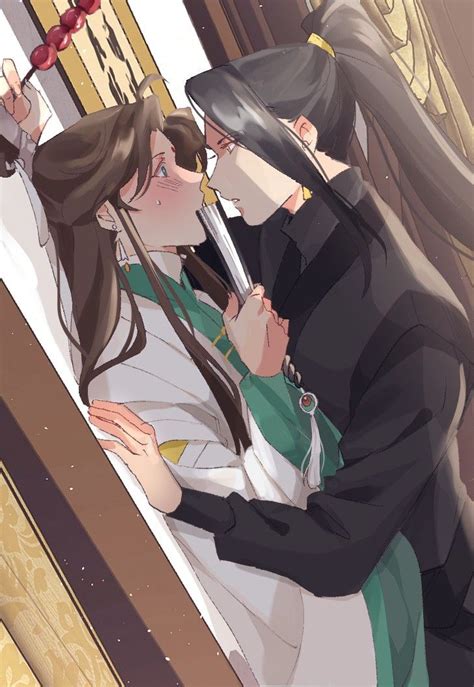 Two Anime Characters Are Kissing In Front Of A Mirror With Their Hands