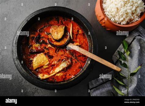 Homemade Kerala fish curry served with boiled rice Stock Photo - Alamy