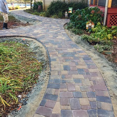 Smooth Curves Make This Belgard Cambridge Cobble Paver Walkway