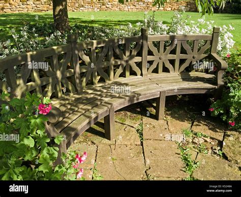 Large Curved Wooden Garden Bench Seat Coton Manor Gardens