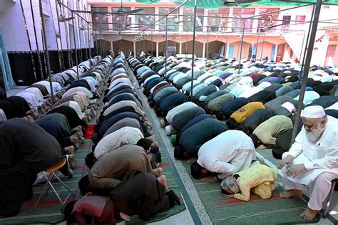 A Large Number Of People Offering Jumma Tul Wida Prayer During The Holy