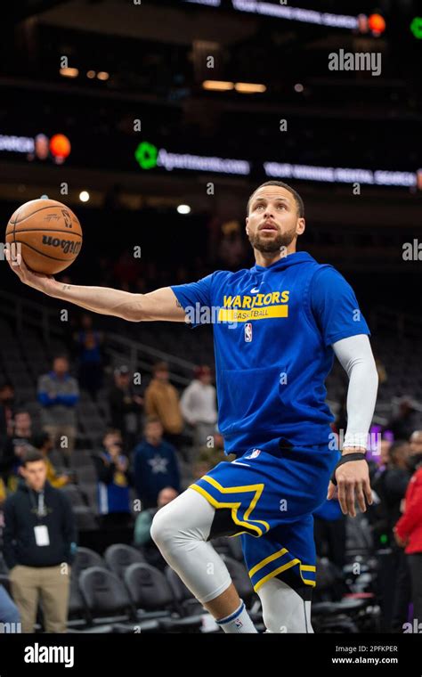 Golden State Warriors Guard Stephen Curry Shoots During Warmups Before An Nba Basketball Game