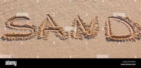 Word Sand Written On Beach Sand Horizontal Shot Stock Photo Alamy