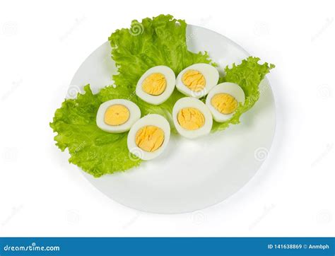 Halves Of Boiled Chicken Eggs On Lettuce On Dish Stock Image Image Of