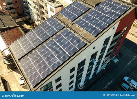 Aerial View Of Solar Photovoltaic Panels On A Roof Top Of Residential