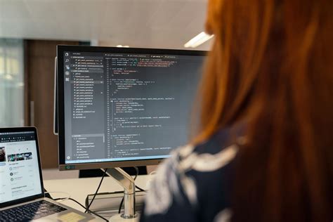 Female Software Engineer Coding On Computer · Free Stock Photo