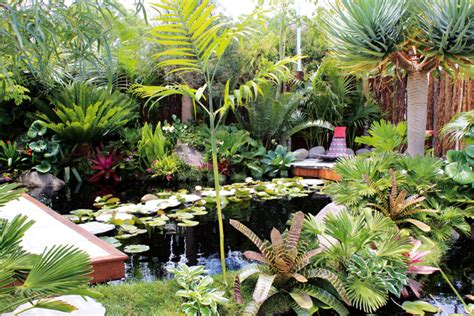 A Luxuriant Resort Style Garden With Lagoons And A Waterfall Feature