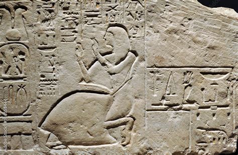 Reliefs with hieroglyphs of ancient Egyptian art Stock Photo | Adobe Stock